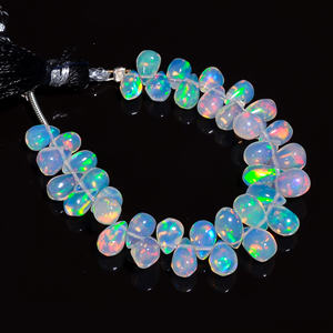 Perles d'opale éthiopienne naturelle aux prix les plus bas avec perles d'opale lisse en forme de larme et poids de 24.50 ct à vendre - Product Image 1