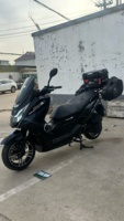 Scooter T10 Maxi d'occasion en excellent état. Moteur 250cc, valises complètes, affichage numérique, entièrement fonctionnel, noir, CVT