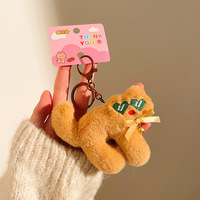 Nouveau porte-clés chien en peluche avec lunettes et cœur, design original, pour décoration de sac à dos