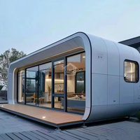 Maison conteneur en forme de pomme avec toit solaire - Structure en acier à assemblage rapide pour une utilisation extérieure écologique et des cafés mobiles
