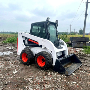 Chargeuse compacte sur pneus S160, roues blanches et rouges, machine de construction d'occasion - Product Image 1