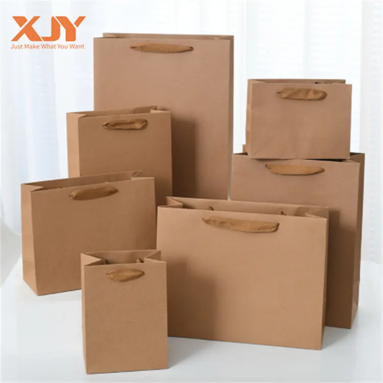 XJY kişiselleştirilmiş monokrom baskılı kraft kağıdı torba özel logo biyobozunur kağıt torba ile noel hediyesi torba