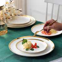 Service de vaisselle de luxe à bord doré, assiettes plates en céramique blanche, porcelaine nordique, pour mariage et restaurant