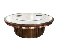 Table de restaurant haut de gamme luxueuse avec bord rond en bois et centre rotatif pour fondue