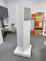 Étagère rotative sur pied avec miroir et crochets pour l'affichage des produits en magasin, taille et couleur personnalisées