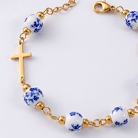Bracelet chapelet en perles de porcelaine bleue et blanche avec croix en acier inoxydable, bijou religieux catholique vintage pour femmes