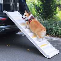 Rampe d'escalier pliable portable pour chien noir et blanc