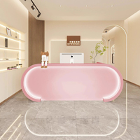Meilleure vente Bureau de réception miniature rose à cannelures de haute qualité pour hôtel, salon de beauté
