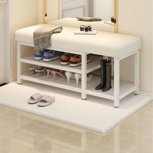 Banco zapatero estilo mantequilla con asiento acolchado y estantería de varios niveles para entrada, ideal para sentarse - Product Image 1