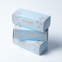 Boîte personnalisée en papier bleu clair avec motif feuille estampé argenté pour emballage de produits de soin naturels
