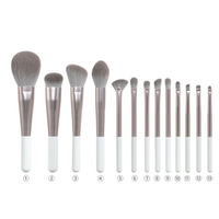 Ensemble de pinceaux de maquillage de luxe professionnel manche en bois blanc poudre de cheveux synthétiques fard à paupières pinceaux correcteur pour outils cosmétiques pour le visage