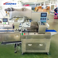 Machine d'emballage alimentaire automatique électrique HANNPRO pour barres énergétiques au chocolat, croquantes et glacées, état neuf, papier d'emballage, sachet