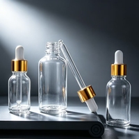 Vente en gros d'usine - Flacon compte-gouttes en verre transparent 10ml 20ml 30ml 50ml 100ml - Flacon vide pour huile essentielle avec bouchon compte-gouttes en aluminium doré