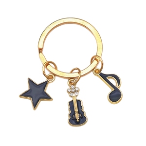 พวงกุญแจโลหะรูปกีตาร์สุดฮิต ดีไซน์เก๋ แฟชั่นสำหรับคนรักดนตรี ใช้ตกแต่งกระเป๋าได้ - Product Image 1