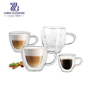 Taza de vidrio de borosilicato resistente al calor, taza de vidrio de doble pared con mango para café, proveedor de china, taza de vidrio de agua para <span class=keywords><strong>tienda</strong></span> - Product Image 1