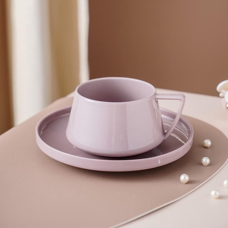 Pinkish-purple coffee cups and saucers