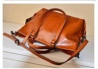 Sac à main vintage en cuir PU pour femme, grande capacité, sac fourre-tout imperméable, sac bandoulière avec pompon, style de créateur de luxe