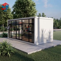 Casa Contenedor de Ensamblaje Rápido con Panel Sándwich, Diseño Moderno, Puerta Corredera de Vidrio para Uso en Hoteles, Oficinas y Estudios