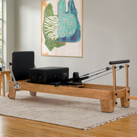 Machine de Pilates Reformer en chêne de haute qualité, durable, portable, réglable, adaptée à la santé, pour le corps et l'usage domestique