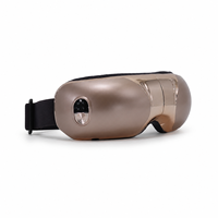 Masseur oculaire intelligent avec chaleur, compression d'air et vibration, masque de soin des yeux portable doré pour les voyages