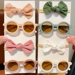 Precio bajo 2 unids/set gafas de sol con bandas elásticas para el cabello Nylon bebé diadema diseño redondo gafas de sol niños Puff Bow Headwear