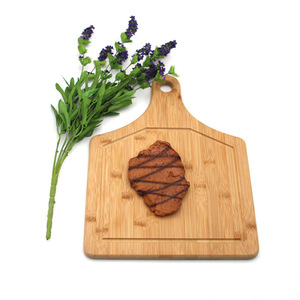 Tabla de cortar de bambú de forma irregular para pan, postres y carne. - Product Image 1