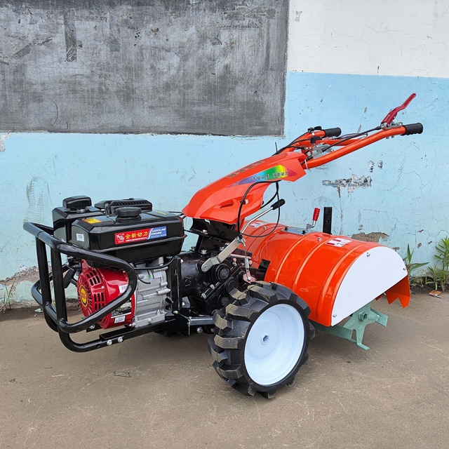 Factory Direct Supply Agriculture Multi-Function Four-Drive Mini Tiller Farm Cultivator 4KW Agricultural Machine