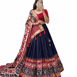 El último diseñador Tussar Silk Patola Impreso Border Lehenga Choli por Fab Zone - Product Image 1