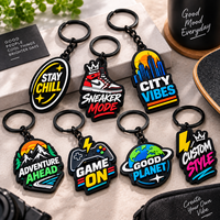 Porte-clés 3D en PVC souple personnalisés pour un style de vie urbain, avec texte motivant et quincaillerie noire, fabrication OEM ODM