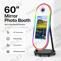 Machine de photomaton ovale 60 pouces avec écran tactile 32 pouces, miroir magique, appareil photo reflex numérique, lumière RVB et impression instantanée pour location de mariage