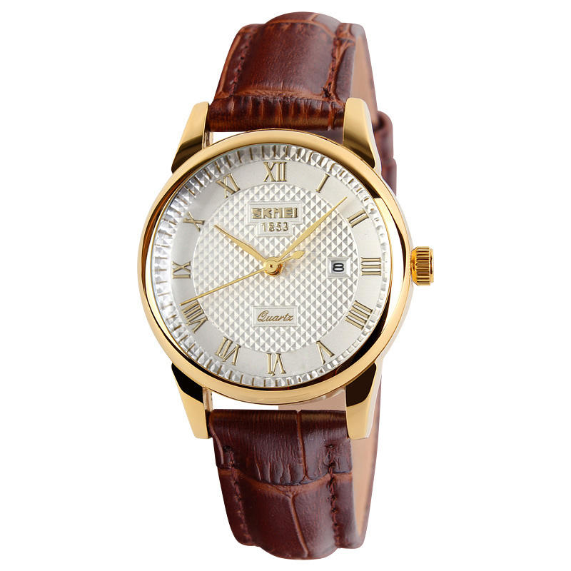 Gold case brown band white dail/lady