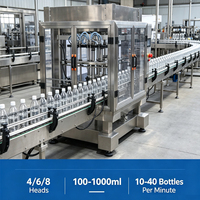 Machine de remplissage automatique à 4 têtes pour bouteilles d'eau potable pure, de jus, de boissons et d'huile, et machine d'emballage