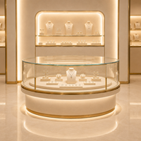 Comptoir de présentation de bijoux avec éclairage LED incurvé personnalisé, structure en métal et bois, mobilier de magasin pour la vente au détail de diamants et de pierres précieuses