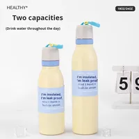Bouteille d'eau isotherme en acier inoxydable grande capacité couleur macaron avec boucle de transport et double couvercle à bec verseur pour le sport
