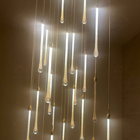 Lustre en verre artistique personnalisé pour villa, suspension en cristal, éclairage d'escalier avec suspension de plafond réglable, nouvelle fonctionnalité
