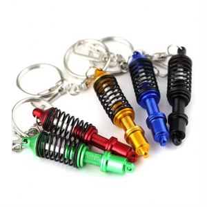 พวงกุญแจโช้คอัพสปริงสีดำแดงสำหรับอะไหล่รถยนต์ขายส่ง - Product Image 1