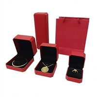 Boîte d'emballage de bijoux haut de gamme en papier effet cuir octogonal rouge de Shenzhen pour bagues, bracelets, colliers et pendentifs