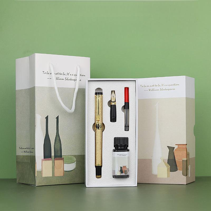 Stylo plume doré + accessoires plume apparente