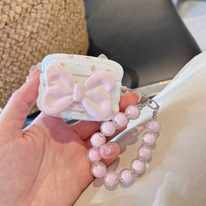 Funda protectora para auriculares AirPods de 4.ª generación, lazo rosa con cordón rosa - Product Image 1