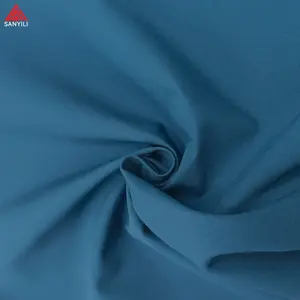 100% Polyester ba-trong-một hợp chất vải thiciy ronior vải may mặc cho áo khoác độn