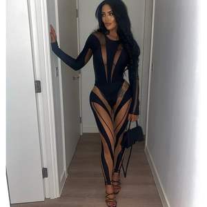 ชุดบอดี้สูทเซ็กซี่แบบคลับ คอลเลคชั่น 2026 สำหรับผู้หญิง สีดำ ผ้าตาข่าย คอสูง ทรงเข้ารูป ตัดเว้า โชว์สัดส่วน แขนยาว โปร่งแสง - Product Image 4