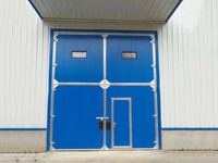 Portes de passage industrielles en acier à double battant pour ateliers et centres logistiques