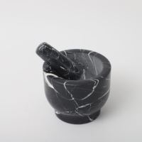 Mortier et pilon en granit à prix avantageux avec un ensemble en marbre noir à utiliser en cuisine