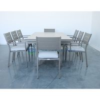 Ensemble de meubles de patio d'extérieur modernes résistants aux intempéries, table extensible en aluminium avec pieds en X et revêtement poudré, et ensemble de chaises de salle à manger