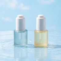 Flacon compte-gouttes en verre mat de 20 ml et 30 ml avec bouton poussoir et impression sérigraphique pour crème de soin et sérum cosmétique
