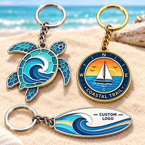 Porte-clés personnalisés en émail dur sur le thème de l'aventure en mer : tortue de mer, voilier, boussole, planche de surf, porte-clés en métal OEM ODM - Product Image 1