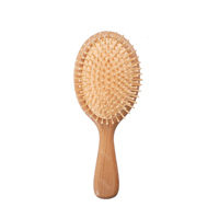 Brosse à cheveux démêlante professionnelle en bambou avec coussin d'air et poils de sanglier, en bois, pour salon de coiffure, vente en gros, logo personnalisé OEM