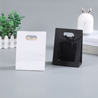 Vente en gros de sac à main de haute qualité avec fenêtre transparente et nœud sac de cadeau de fête avec ruban sac à main de cadeau pour shopping