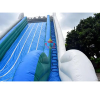 Toboggan sec géant de 42 pieds personnalisé dans le commerce Toboggan sec gonflable à thème d'hiver pour les événements de fête d'enfants