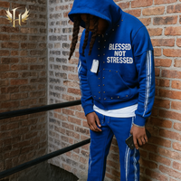 Survêtement personnalisé épais recadrée et bouffée sérigraphié pierres précieuses avec strass sweat à capuche avec fermeture éclair et rivet ensembles de sweats évasés